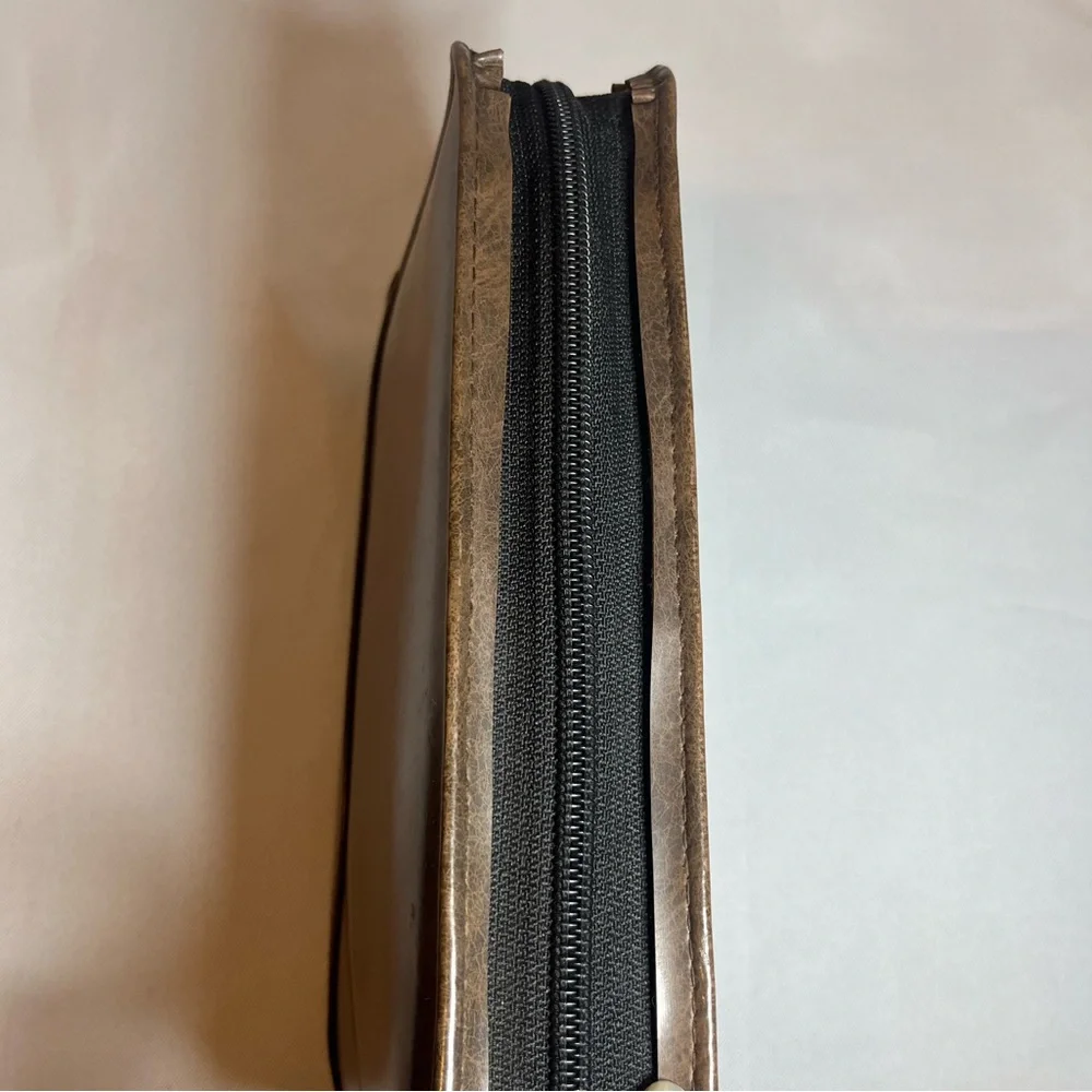 Day Timer Brown Folder With Some Papers